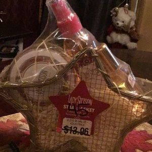Lady Stetson three piece gift set in gold basket. New never opened